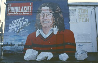 IRELAND, North, Belfast, "Bobby Sands mural on Sinn Fein headquarters on the Falls Road, corner of