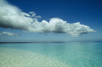 TANZANIA, Zanzibar, Seascape, Seascape off the east coast with large low clouds overhead