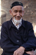 CHINA, Xinjiang , Turpan , Portrait of Uigar man with a white beard