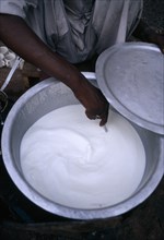 INDIA, Uttar Pradesh, Varanasi, Yogurt making