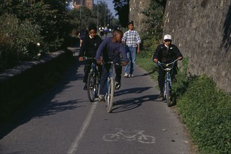 10060124 CHILDREN Leisure Cycling Boys on cycle path in Bristol  England