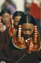 CHINA, Qinghai, Tongren, Tibetan women dancers at festival