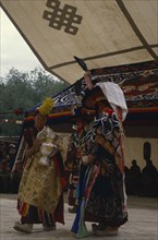 CHINA , Tibet , Tibetan dancers at Full Moon Festival.