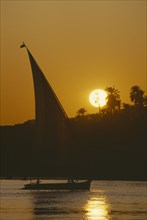 EGYPT,  , Aswan, Felucca on the River Nile at sunset