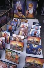INDIA, Punjab, Amritsar, Souvenir pictures of Sikh gurus for sale.