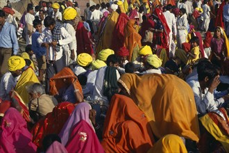 INDIA, Rajasthan, Pushkar, Colourful crowd scene at Pushkar camel fair.