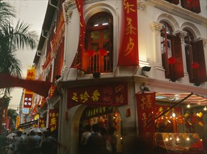 SINGAPORE, Chinatown, Eu Tong street in the evening with buildings decorated for Chinese New Year