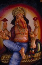 INDIA, Goa, Arambol, Painted temple statue of elephant headed god Ganesh.