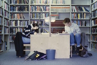 EDUCATION, Library, Oxford Library interior with students studying at desks surrounded by bookcases