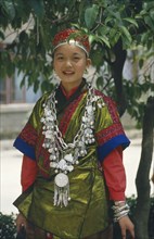 CHINA, Guizhou, Kaili, Miao girl in festival dress