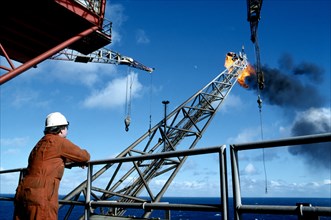 INDUSTRY, Factory, Oil, Oli rig worker on North Sea oil drilling platform