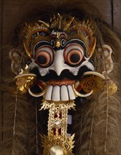 INDONESIA, BALI, "Decorated ornate mask with protruding eyes, teeth and hair "