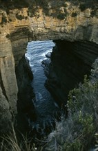 AUSTRALIA, Tasmania, Devils Kitchen, Near Eaglehawk Neck on the Tasman Peninsula.  Coastal rock