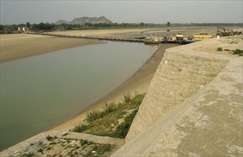 CHINA, Yellow River, View over river and dykes after upstream irrigation leaving only shallow water