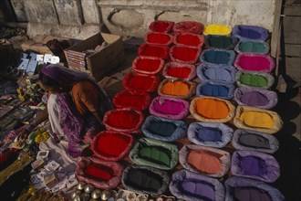 NEPAL, Pushupatinath, Rows of brightly coloured Thika paints for sale at the market