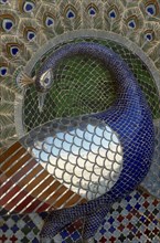 INDIA, Rajasthan, Udaipur, City Palace.  Detail of mosaic depicting a peacock.