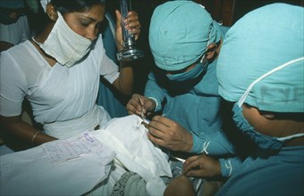 HEALTH, Eyes, Orbis Ophthalmologist operates on patient at a cataract camp in Calcutta