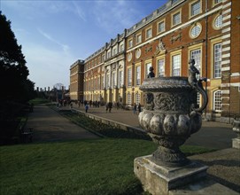 ENGLAND, London, Hampton Court Palace exterior and visitors.