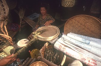 CAMBODIA, Kompong Thom, Marijuana drugs and basket vendor.