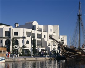 TUNISIA, Port El Kantaoui , View across the marina towards white apartment buildings.