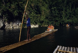 WEST INDIES, Jamaica, Rio Grande, Tourists being taken on rafts down the river