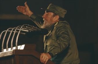 CUBA, Politics, Fidel Castro in military uniform making a speech from a podium