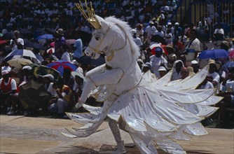 WEST INDIES, Barbados, Crop Over festival celebrating the sugar cane harvest with reveller dressed