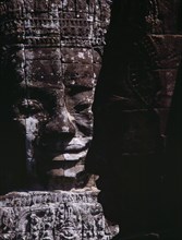 CAMBODIA, Angkor, The Bayon.  Detail of massive stone face.