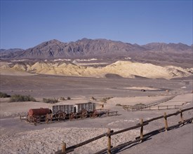 USA, California, Death Valley, Historic Harmony Borax Works. Wooden containers and steel cylinder