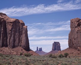 USA, Arizona, Monument Valley, The North Window View through rock features to isolated mesa and