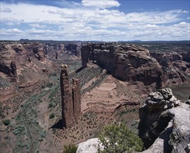 USA, Arizona, Canyon de Chelly, View looking down to Spider Rock with canyon beyond and scree