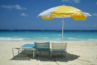 BERMUDA, Long Bay Beach, Umbrella and sun loungers on beach