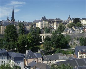 LUXEMBOURG, Luxembourg City, General view across the city rooftops showing city walland distant