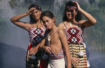 NEW ZEALAND, Maori,  Children in costume performing Poi dance.