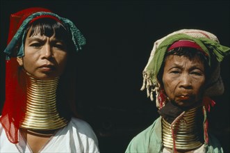 THAILAND, People, Padaung women refugees from Myanmar with their necks encased in traditional rings