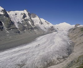AUSTRIA, Karnten, Pasterze Glacier, View looking up glacier showing lateral moraine and mountainous