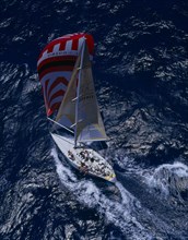 HAWAII, Sport, Sailing, Aerial view over people on yacht  sailing across the sea