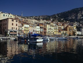 FRANCE, Provence Côte d’Azur, Alpes Maritimes, "Villefranche sur Mer, harbour with moored fishing