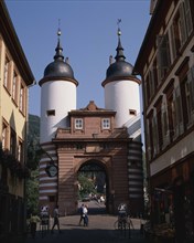 GERMANY, Bad Wurttemberg, Heidelberg, The Bridge Gate with white twin towers and black domes on a