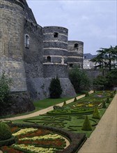 FRANCE, Maine et Loire, Angers, Chateau d’Angers formal gardens and towers.