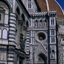 ITALY, Tuscany, Florence, Part view of exterior walls of the Baptistry and the Duomo.