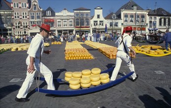 HOLLAND, Noord Holland, Alkmaar, Cheese carriers at the friday cheese market in Waagplein Square