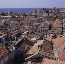 CROATIA, Dubrovnik, View over rooftops of the city with the sea beyond