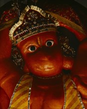 INDIA, Rajasthan, Udaipur, Detail of temple statue of Hanuman the monkey god.