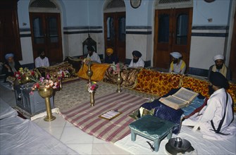 INDIA, Patna, Continuous reading of Guru Granth Sahib Sikh holy book.