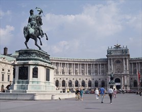 AUSTRIA, Lower Austria, Vienna, Hofburg Palace. Equestrian statue on plinth standing in courtyard