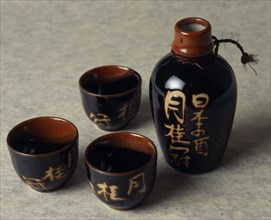 JAPAN, Markets, Ceramic Sake bottle and cups