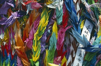 JAPAN, Honshu, Hiroshima, Paper origami cranes at the Children’s Memorial in the Peace Park gardens