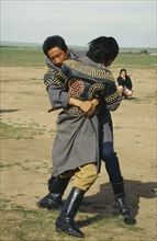 MONGOLIA, Sport, Wrestling, Young men wrestling