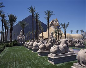USA, Nevada, Las Vegas, Luxor Hotel and Casino Pyramid shaped building with Sphinx and row of stone